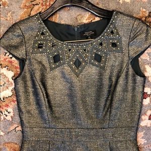 Tahari Green/Gold dresswith embellished neck.